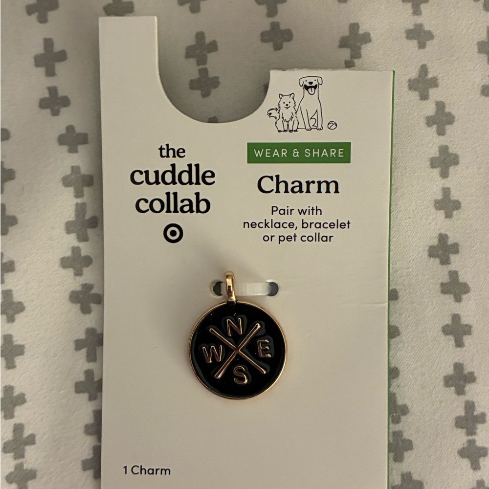 The Cuddle Collab Black and Gold Charm